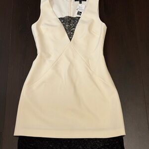 Chic Cream Backless Dress with Lace Accent